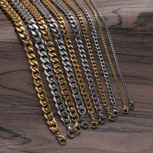 Detailed comparison of gold and silver stainless steel Cuban link chains with lobster clasps