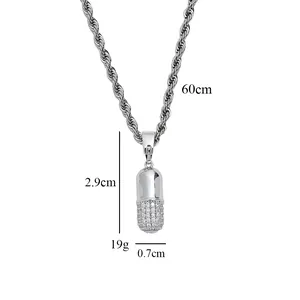 Detalles del colgante de cápsula 2,9cm x 0,7cm y una cadena de cuerda de 60cm largo