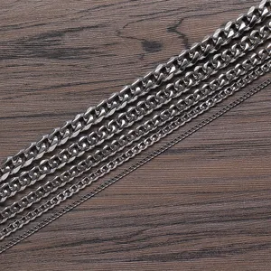 Detailed macro shot of stainless steel Cuban link chains in five different widths