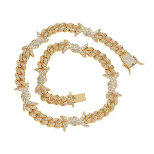 10mm iced out Cuban chain with golden X-link design and pavé set cubic zirconia