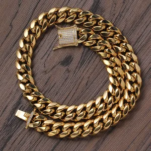 14mm golden stainless steel Cuban link necklace with iced out zircon clasp on wood