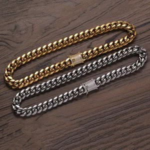 14mm cuban link necklaces in gold and silver with diamond-set box clasps on wood