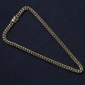 Close-up of golden Cuban link chain featuring a secure industrial safety buckle