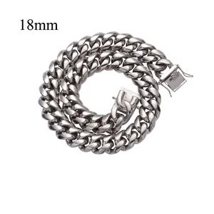 Detail shot of 18mm silver Cuban link necklace with a secure box clasp mechanism