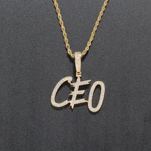 Detail of hip hop CEO letter pendant with micro-paved zircons on a gold twist chain