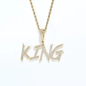Detail of gold-plated KING pendant with micro-pave zircons and twisted rope chain