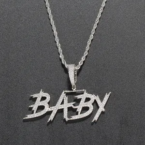 Detailed view of silver BABY letter pendant with sparkling micro-paved zircons