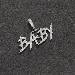 Macro shot of silver BABY letter pendant with micro-paved zircons and jagged edges