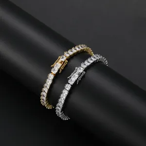 Detail of 4mm square zircon tennis chains in gold and silver with secure lobster clasps