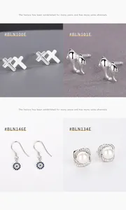 Collection of sterling silver earrings featuring cross, dolphin, pearl and gem designs