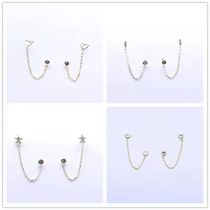 Set of four gold S925 silver chain earrings with heart, star, and diamond charms