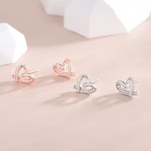 Minimalist S925 sterling silver heart earrings with white enamel and pavé zircon accents