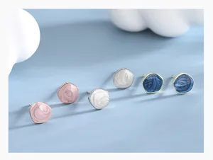 Detailed view of s925 silver stud earrings set featuring colorful marble enamel textures