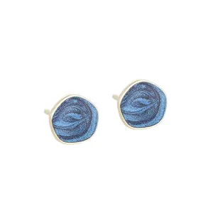 Minimalist s925 silver earrings with irregular gold frames and blue swirling enamel