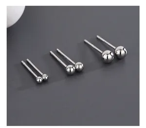 Macro view of S925 sterling silver ball earrings in three sizes with clear hallmark