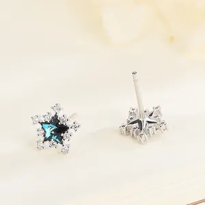 S925 zilveren ster oorsteker met blauwe zirkoon en omliggende kleine witte stenen