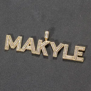 Close-up of MAKYLE gold-plated letter pendant with micro-pave white zircon inlay