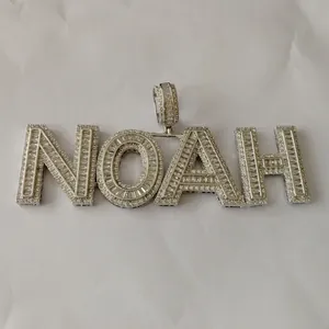 Macro detail of custom silver NOAH pendant with baguette and round zircon stones