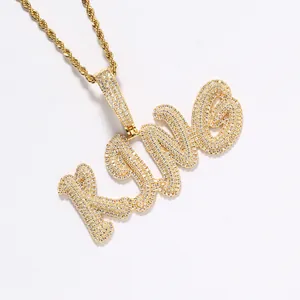 Gold plated KING letter pendant necklace with iced out cubic zirconia and rope chain