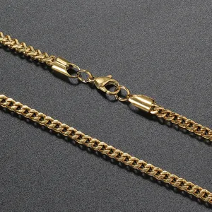 Detailed close-up of 3mm gold stainless steel Cuban chain with durable lobster clasp