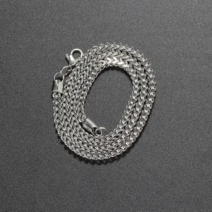 Close-up of silver 3mm stainless steel wheat chain necklace with lobster clasp
