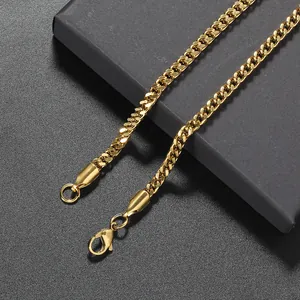 Close-up of 3mm golden cuban link necklace with polished finish and lobster clasp