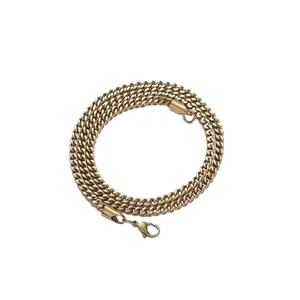 3mm golden stainless steel Cuban link chain with secure lobster clasp on white background