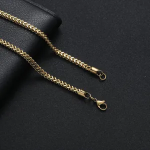 3mm golden stainless steel franco chain necklace with secure lobster clasp on leather