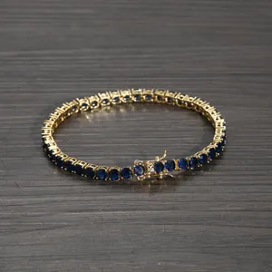 Klassisches 4mm blaues Zirkonia Tennisarmband in Goldoptik mit sicherem Doppelverschluss
