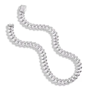 Detailed view of silver Cuban chain with baguette-cut stones and folding clasp