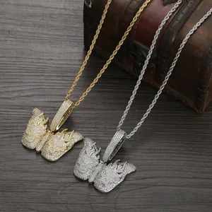 Gothic butterfly pendant with skull flames design and iced-out zircons in gold and silver