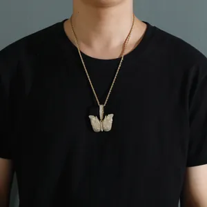 Iced out gold butterfly pendant necklace with micro paved zircons on rope chain