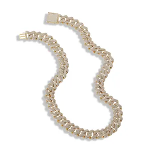 Close-up of 13mm gold Cuban link chain with paved zircons and a square box clasp