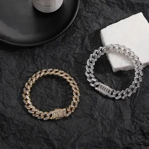 Detailed macro view of 12mm baguette zircon paved Cuban link bracelet in gold and silver