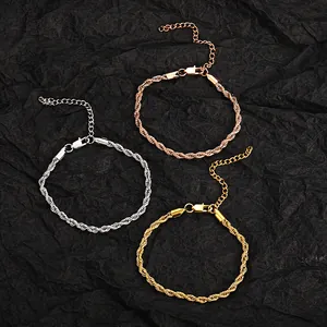 Detail of twisted rope chains in gold, rose gold, and silver with adjustable extensions