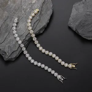8mm gold and silver tennis bracelets with halo round cubic zirconia on black stone surface