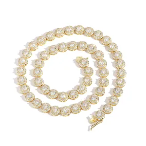 Detail of 8mm gold tennis chain with round zircon clusters and secure box clasp