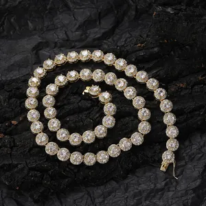 Close-up of 8mm gold tennis chain featuring round cubic zirconia and a secure clasp