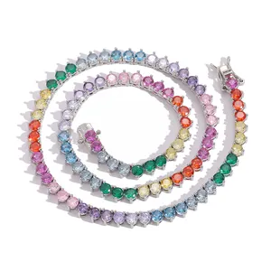 Detailed macro view of rainbow tennis chain with multi-color stones and silver clasp