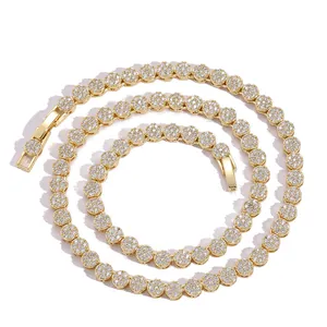 Macro shot of 5mm gold hip-hop tennis necklace with round cubic zirconia pave links