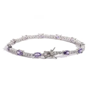 Detail view of purple oval crystal tennis bracelet with secure double safety clasp