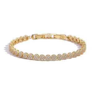 Macro shot of 5mm gold tennis bracelet showing detailed zircon inlay and clasp