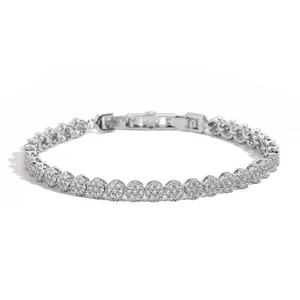Macro detail of 5mm silver tennis chain with brilliant round-cut cubic zirconia stones