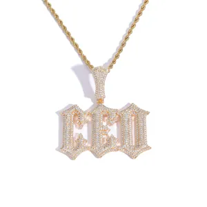 Close-up of golden CEO alphabet pendant with pavé cubic zirconia on a rope chain