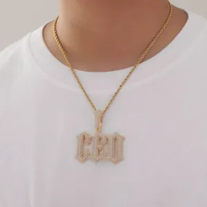 Iced out CEO letter pendant necklace with gold rope chain and cubic zirconia inlays