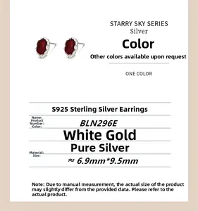 Detail view of S925 sterling silver red gemstone earrings with silver wavy texture