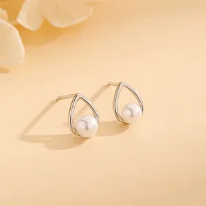 Elegant hollow teardrop pearl stud earrings in S925 sterling silver for women