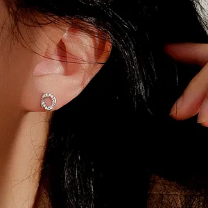Minimalist S925 sterling silver geometric hoop earrings with zircon on a female model
