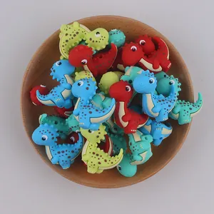 Cuentas de silicona de dinosaurios coloridos para cadenas de chupetes de bebé bricolaje