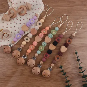 Set of 6 beech wood and silicone pacifier clips with crochet beads and flower charms